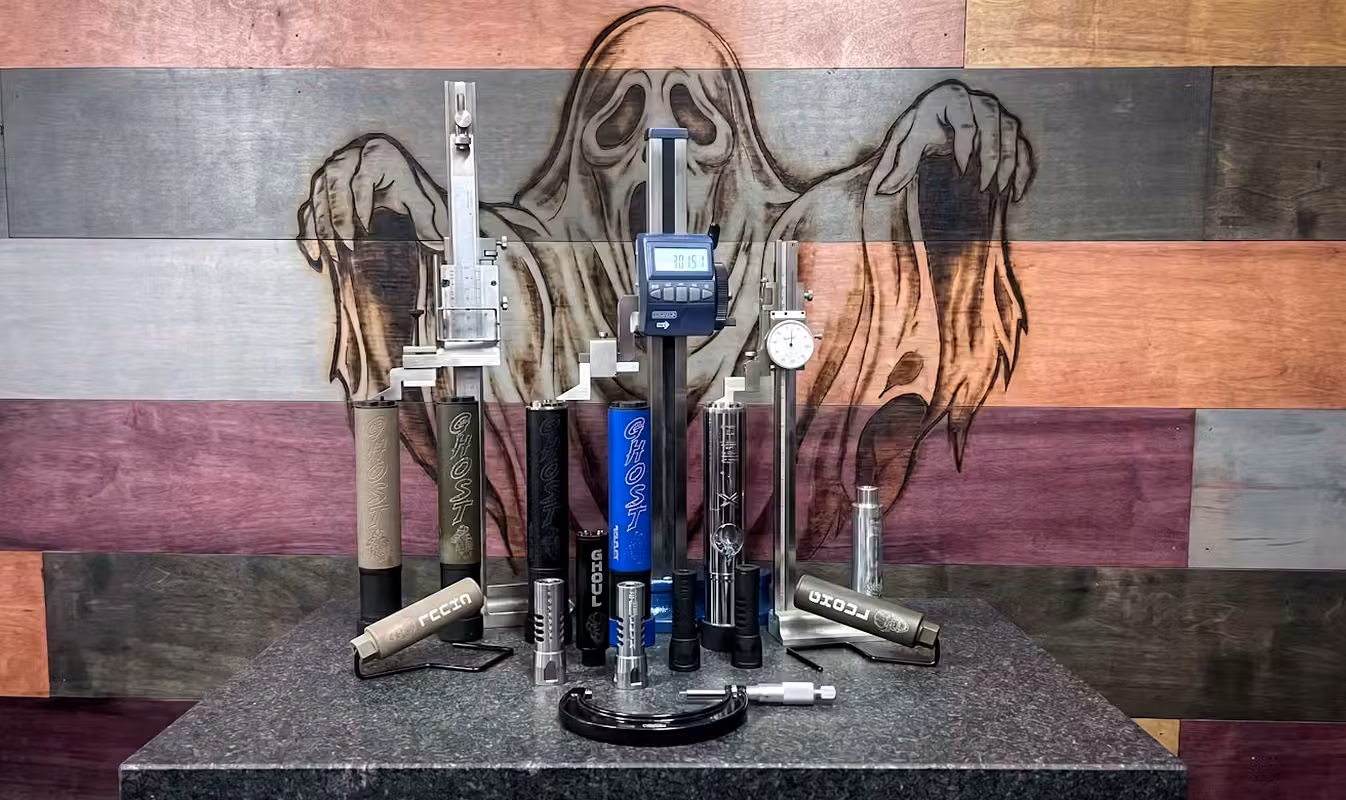 Fenix Armory suppressor lineup on granite QC plate